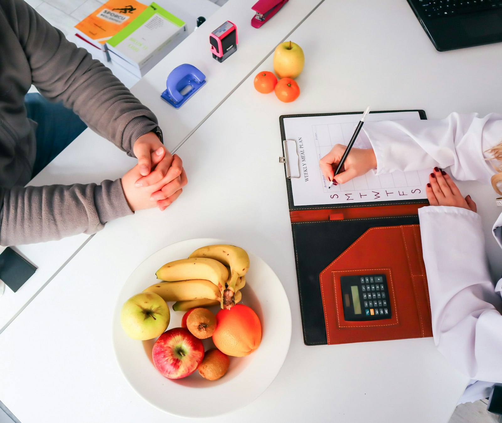 Dietitian consulting with a patient